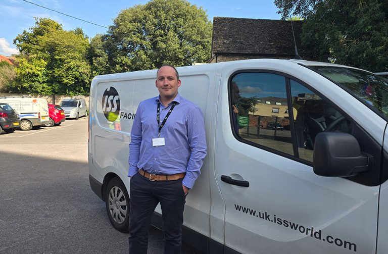Daniel stood next to a van